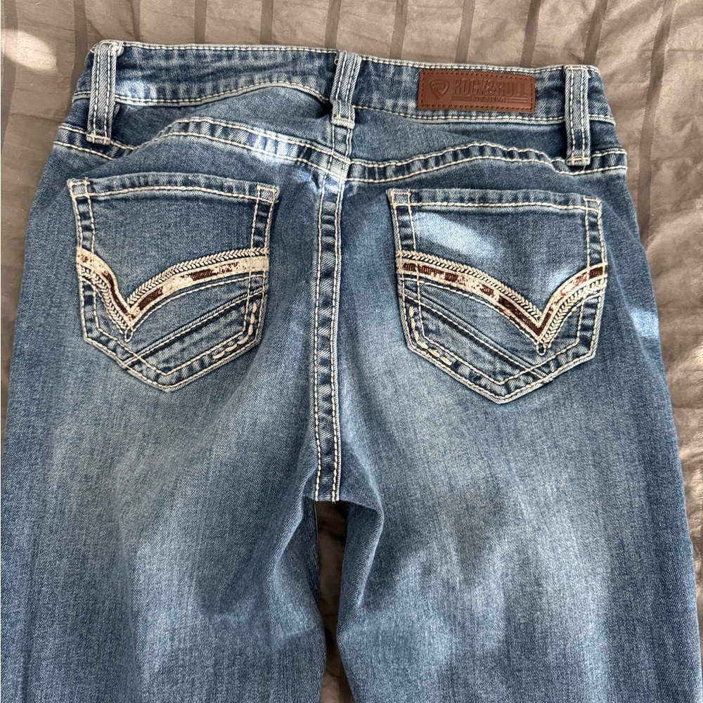 Blue Boot Cut Jeans with Distressed Look